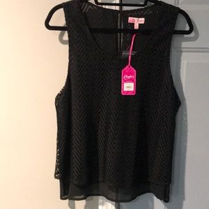 Black with black sheer underlining. Machine Washable